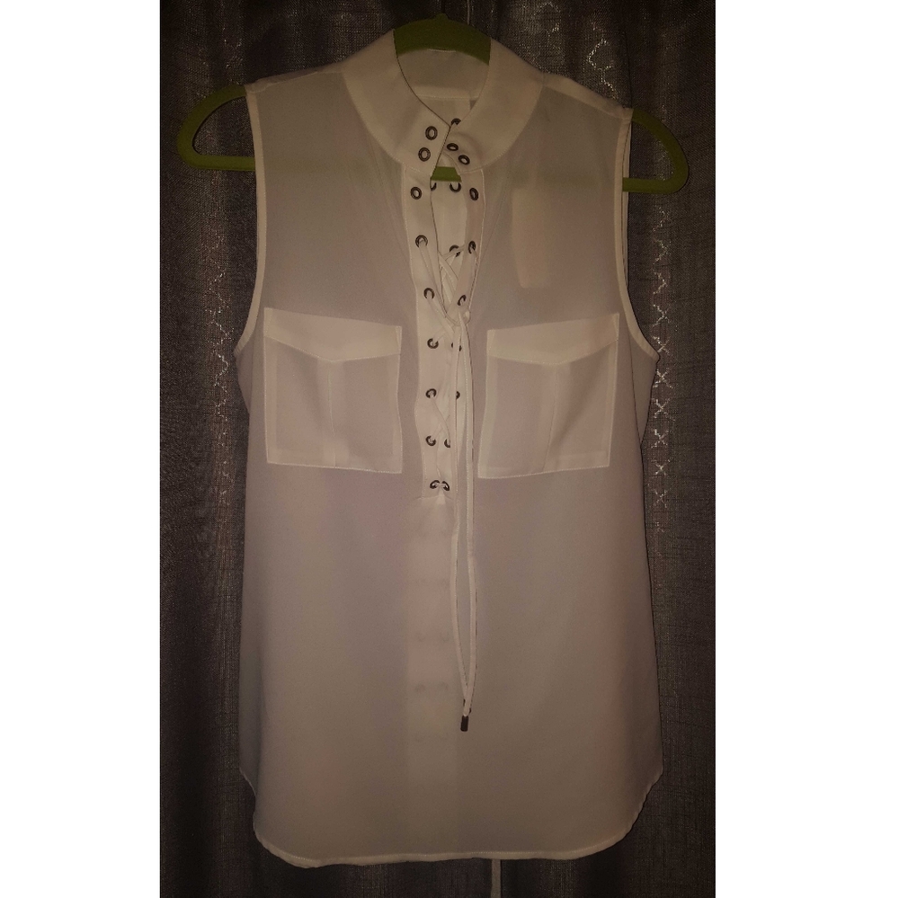 Sleeveless lace up top